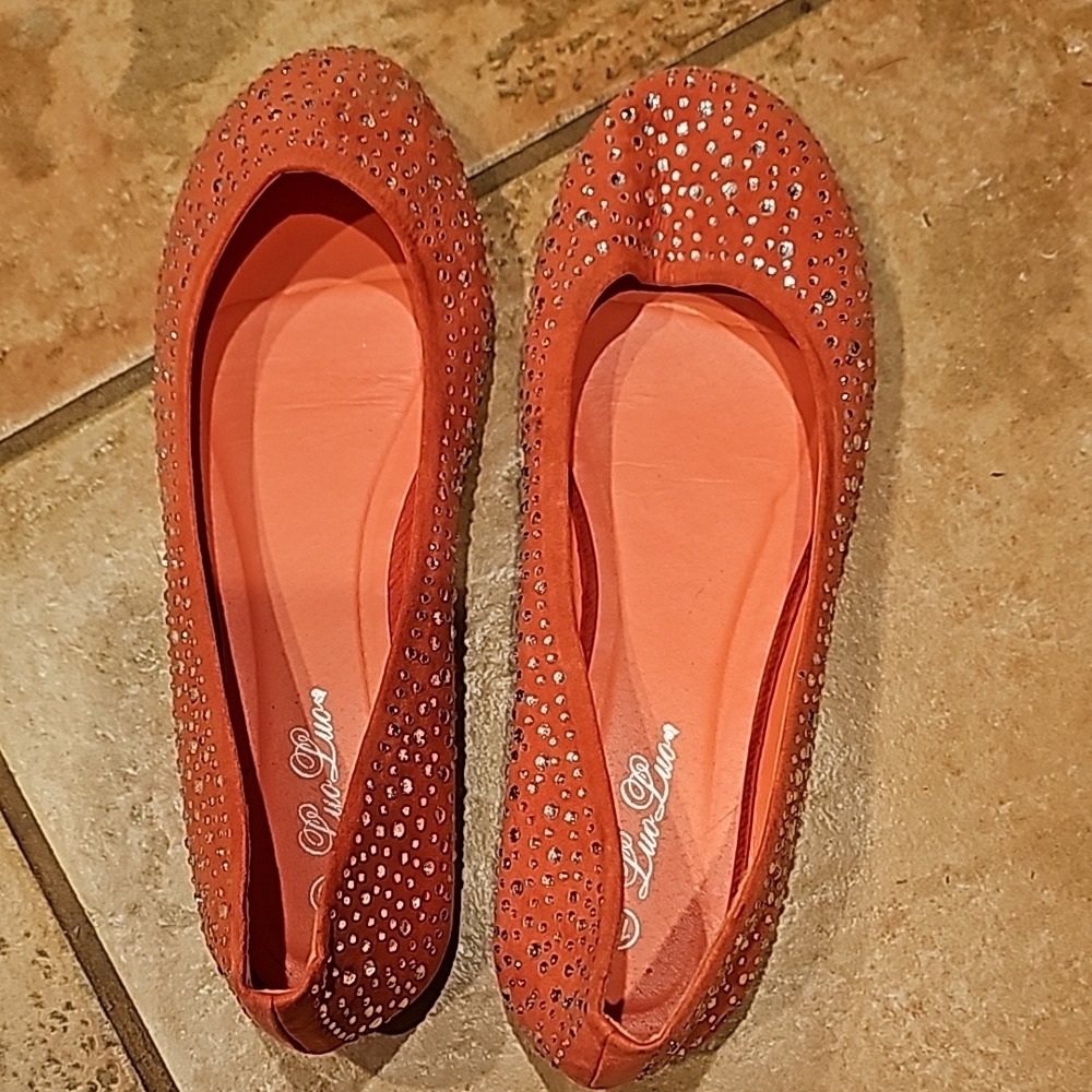 Orange Perforated Flats with Soft Material and Classic Silhouette
